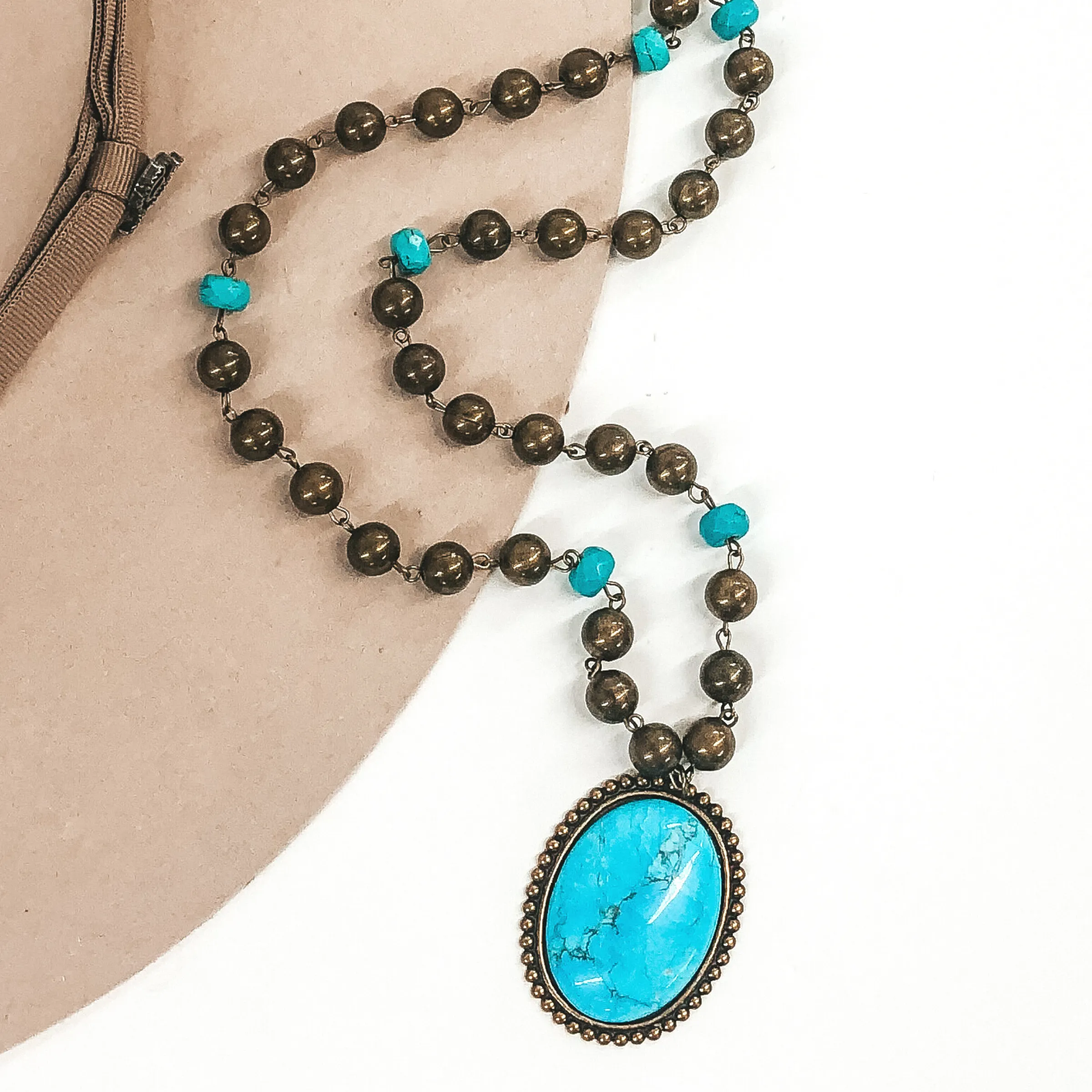 Pink Panache | Burnished Bronze and Turquoise Beaded Necklace with Medium Bronze Oval Turquoise Cabochon Pendant