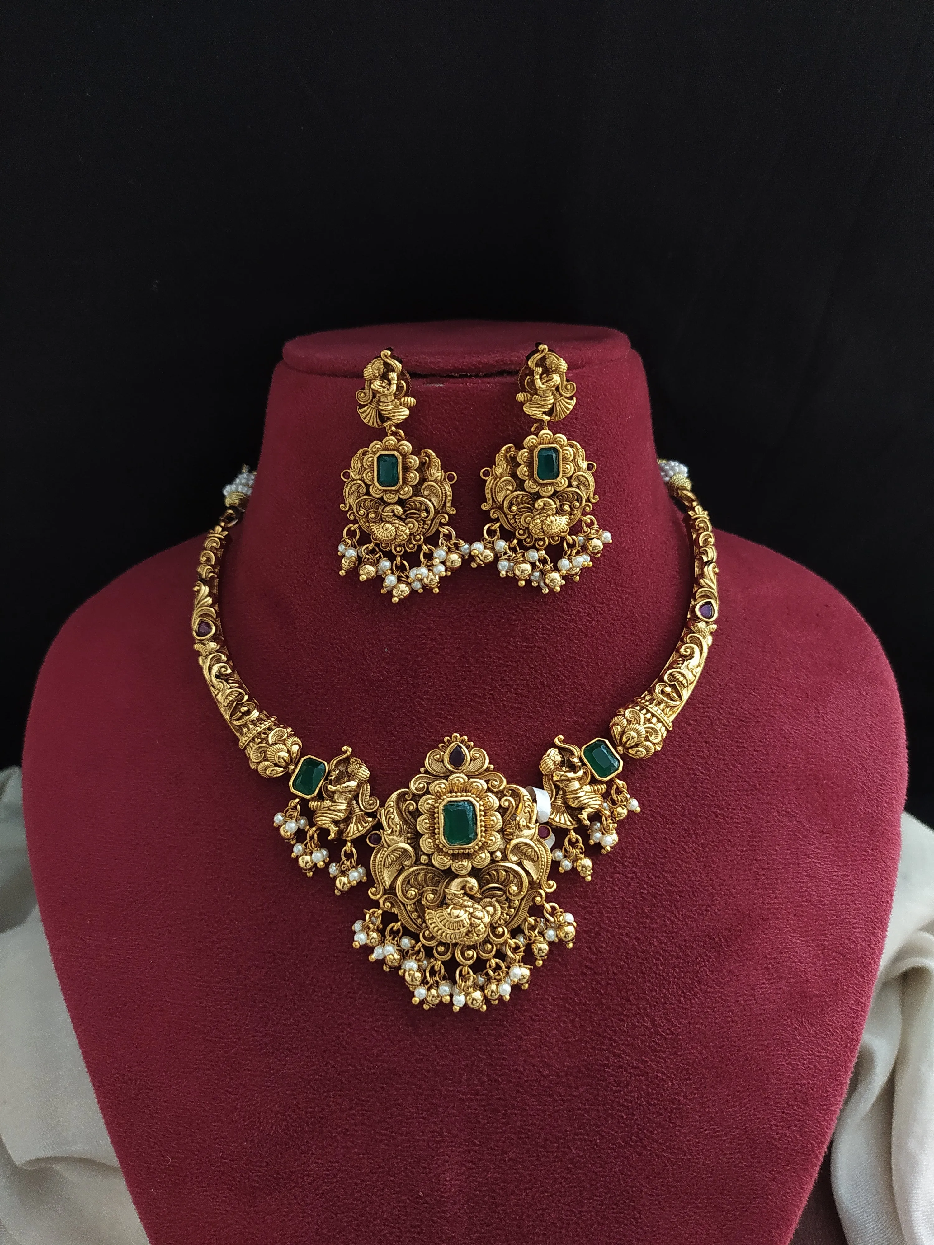 "Antique Kanti (Hasli) Necklace Set with Emerald Stones and Nagas Work"